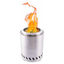 Vatra de masa RedFire Volcano Medium din inox, aprinsa, cu flacara in partea de sus, vazuta in studio